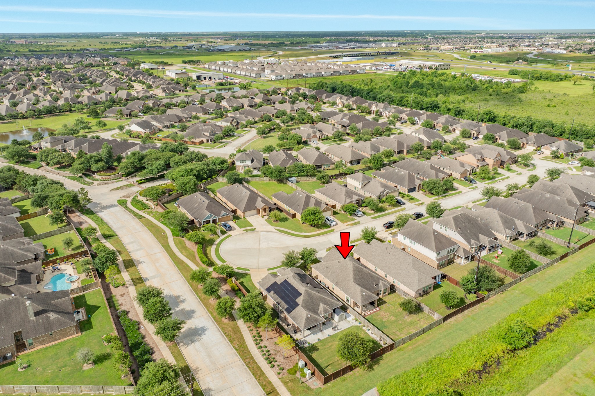 3519 Bay Drive Rosharon, TX 77583 - Photo 34 of 49 Aerial view of the surrounding homes in the Meridiana community, showcasing the neighborhood layout and proximity to local amenities.