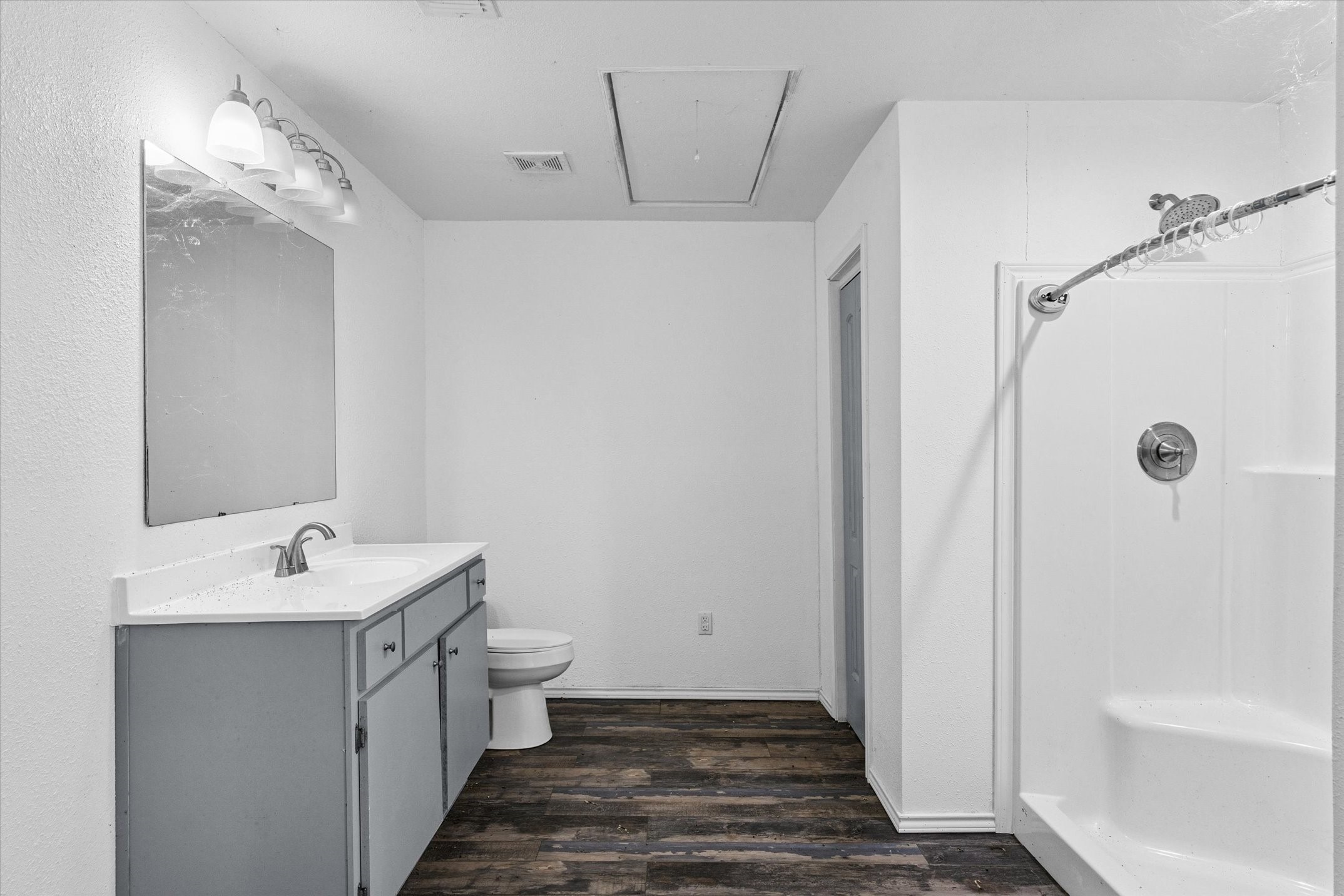 410 Pleasure Land Road Gun Barrel City, TX 75156 - Photo 25 of 33 a bathroom with a sink a toilet and shower