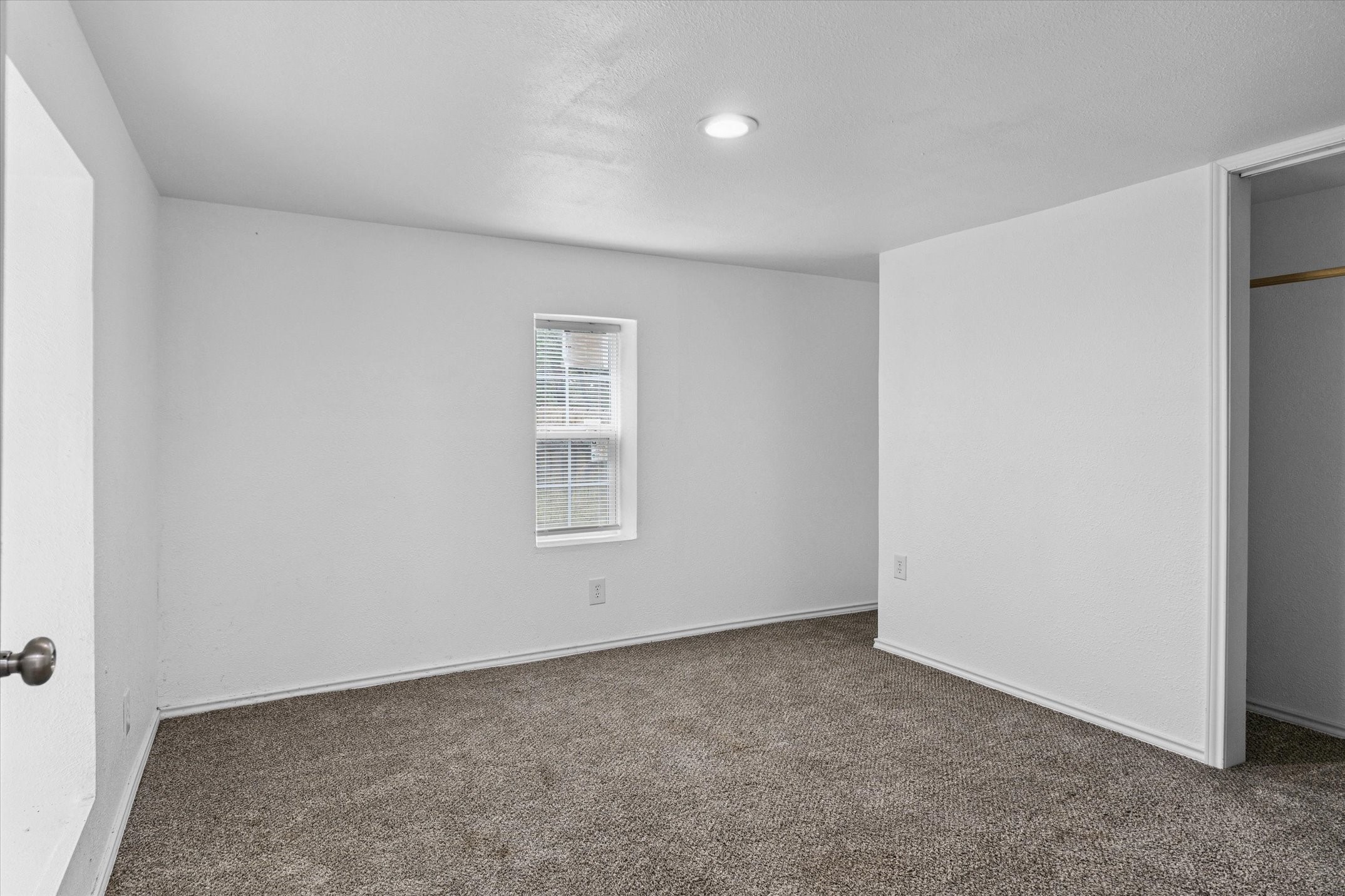 410 Pleasure Land Road Gun Barrel City, TX 75156 - Photo 27 of 33 an empty room with windows