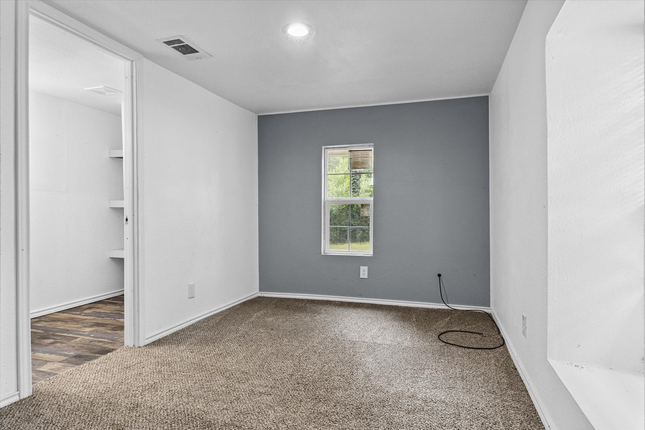 410 Pleasure Land Road Gun Barrel City, TX 75156 - Photo 29 of 33 a view of room with window and ceiling fan