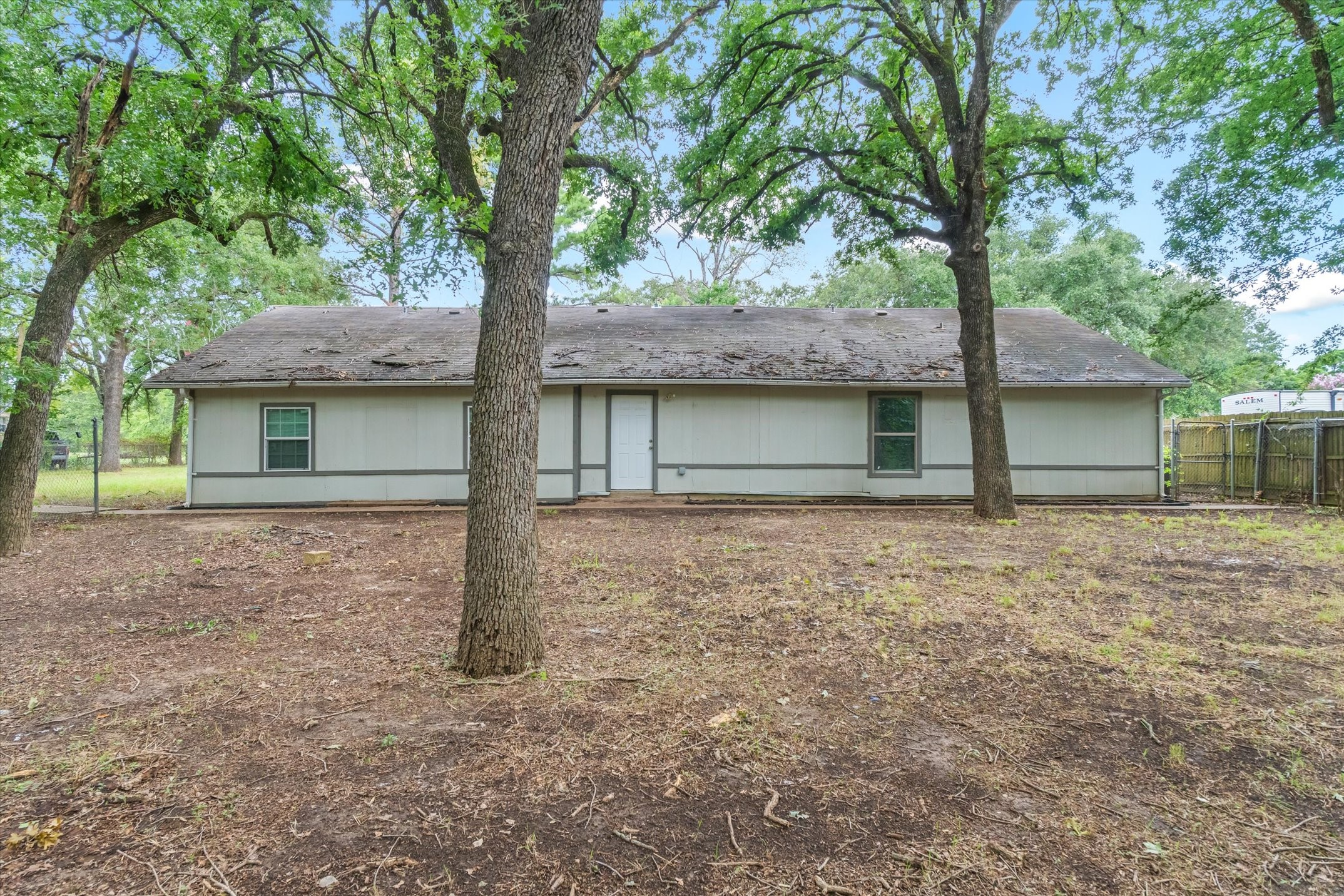 410 Pleasure Land Road Gun Barrel City, TX 75156 - Photo 31 of 33 a front view of a house with a garden