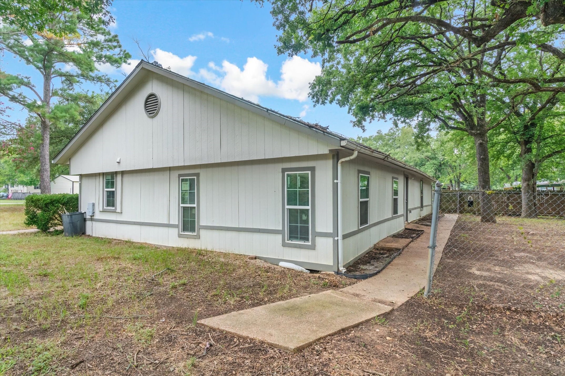 410 Pleasure Land Road Gun Barrel City, TX 75156 - Photo 32 of 33 a front view of a house with a yard and garage