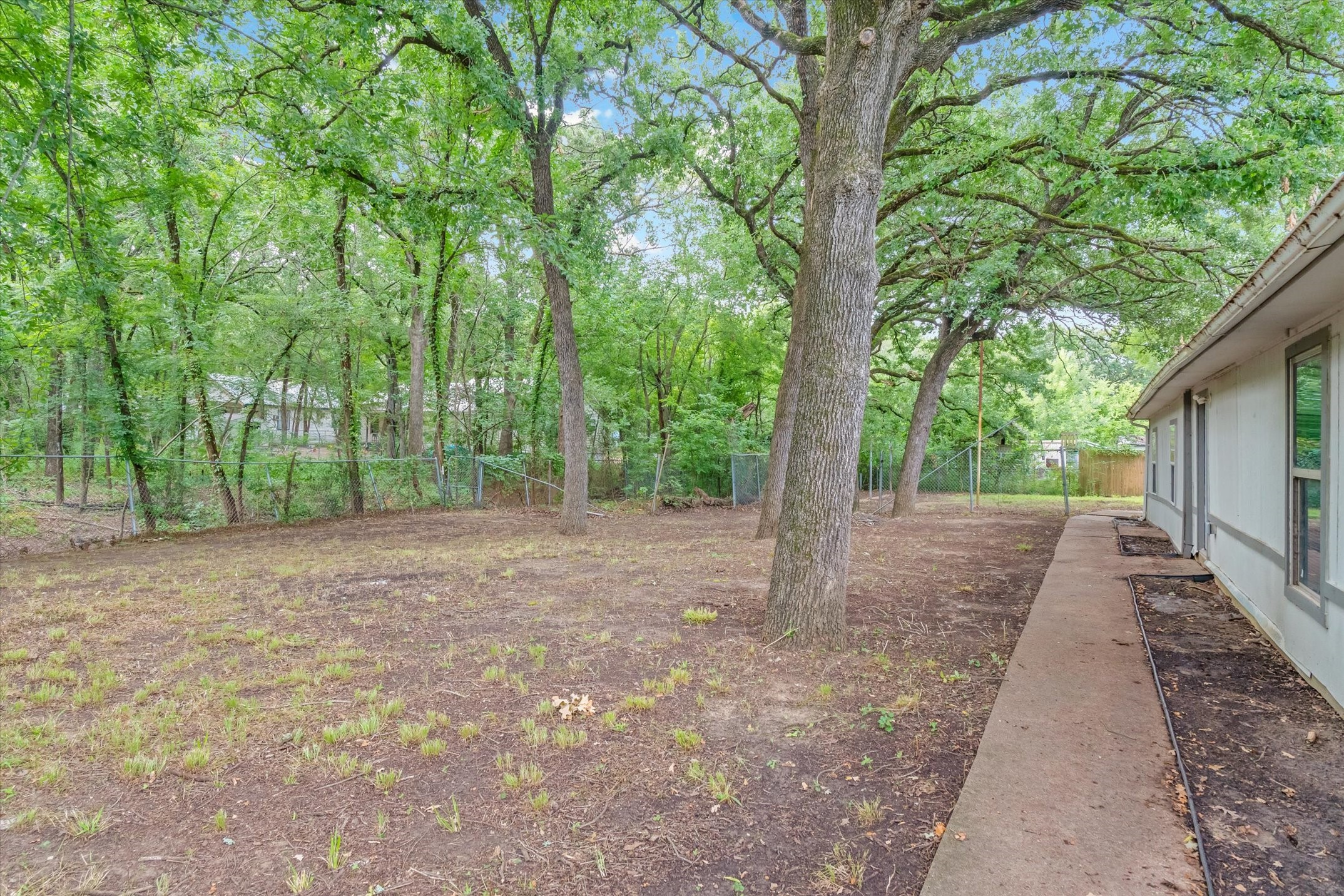 410 Pleasure Land Road Gun Barrel City, TX 75156 - Photo 33 of 33 a view of a yard with large trees