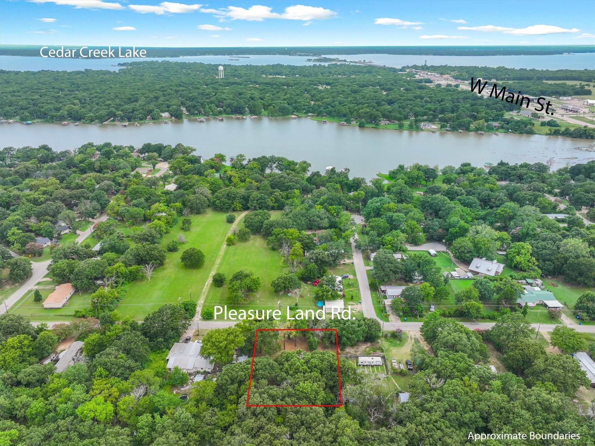 410 Pleasure Land Road Gun Barrel City, TX 75156 - Photo 4 of 33 a view of a lake with a city view