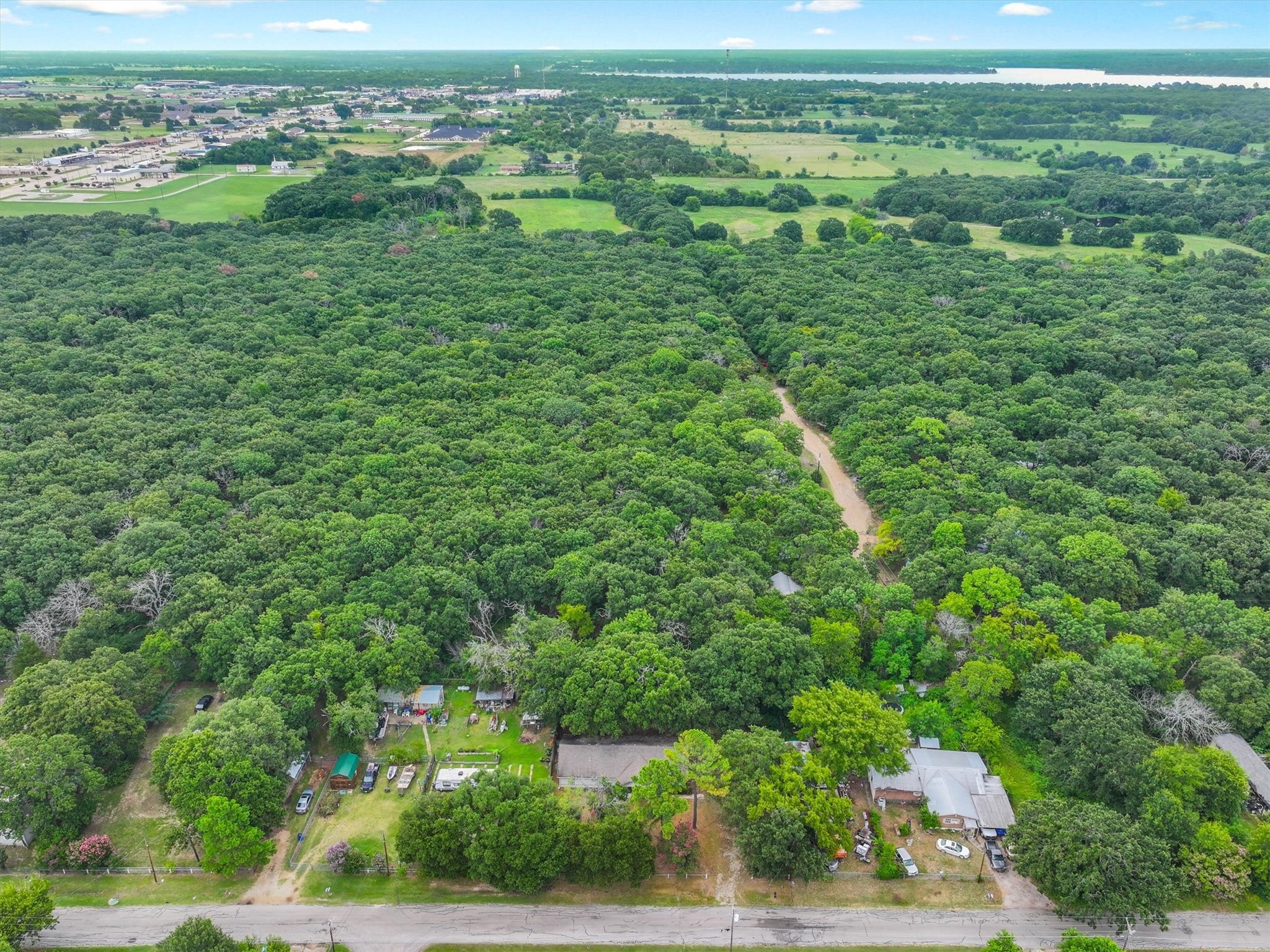 410 Pleasure Land Road Gun Barrel City, TX 75156 - Photo 7 of 33 a view of a lush green field