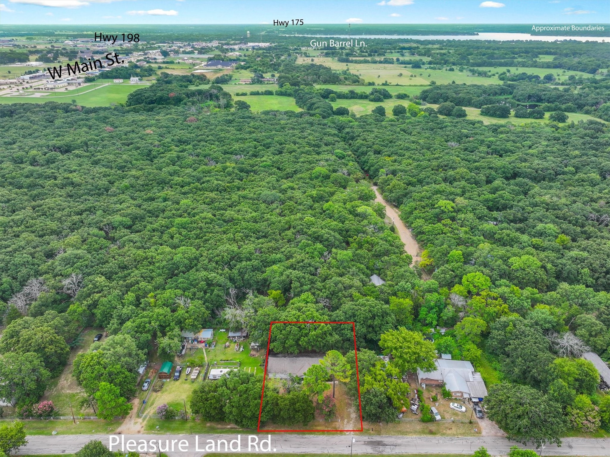 410 Pleasure Land Road Gun Barrel City, TX 75156 - Photo 8 of 33 a view of a green field