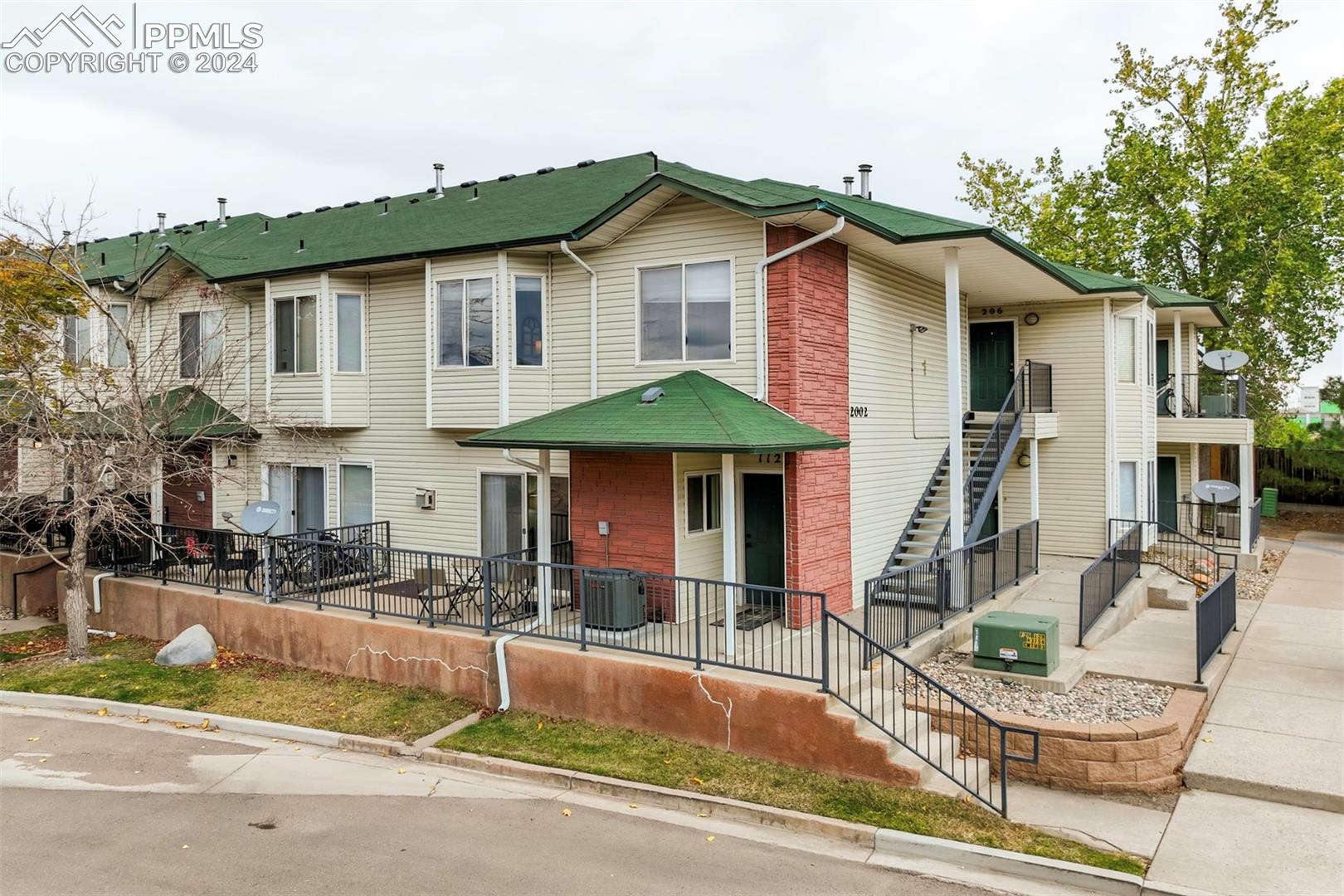 2002 Legacy Ridge View, Unit 112 Colorado Springs, CO 80910 - Photo 1 of 37 View of front facade