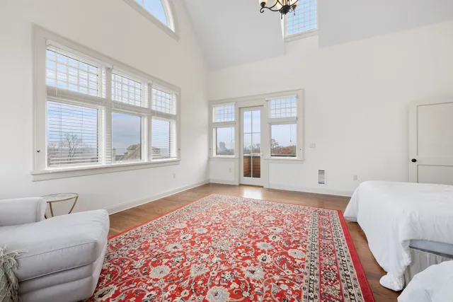 a living room with a couch next to a window