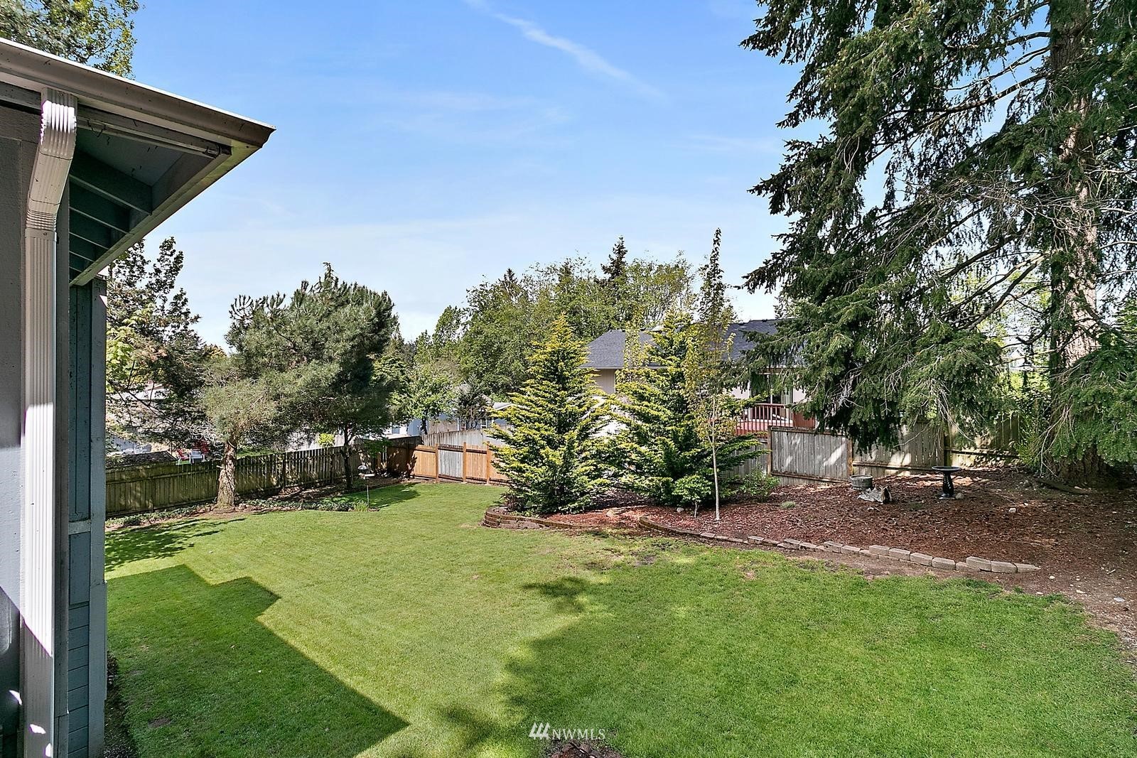 509 Roe Street Steilacoom, WA 98388 - Photo 35 of 40 a view of a backyard with a garden