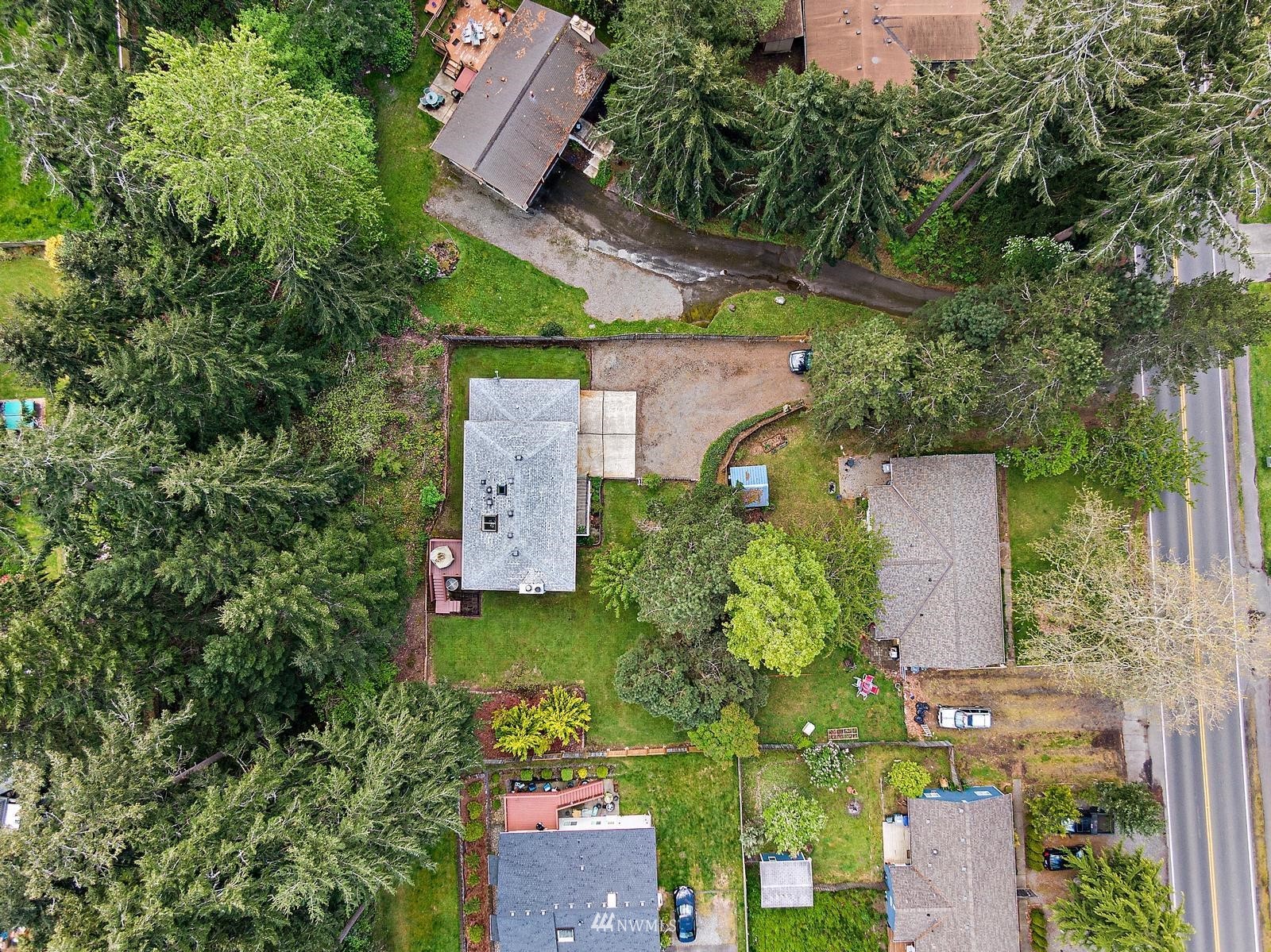 509 Roe Street Steilacoom, WA 98388 - Photo 38 of 40 an aerial view of a house with a yard and garden