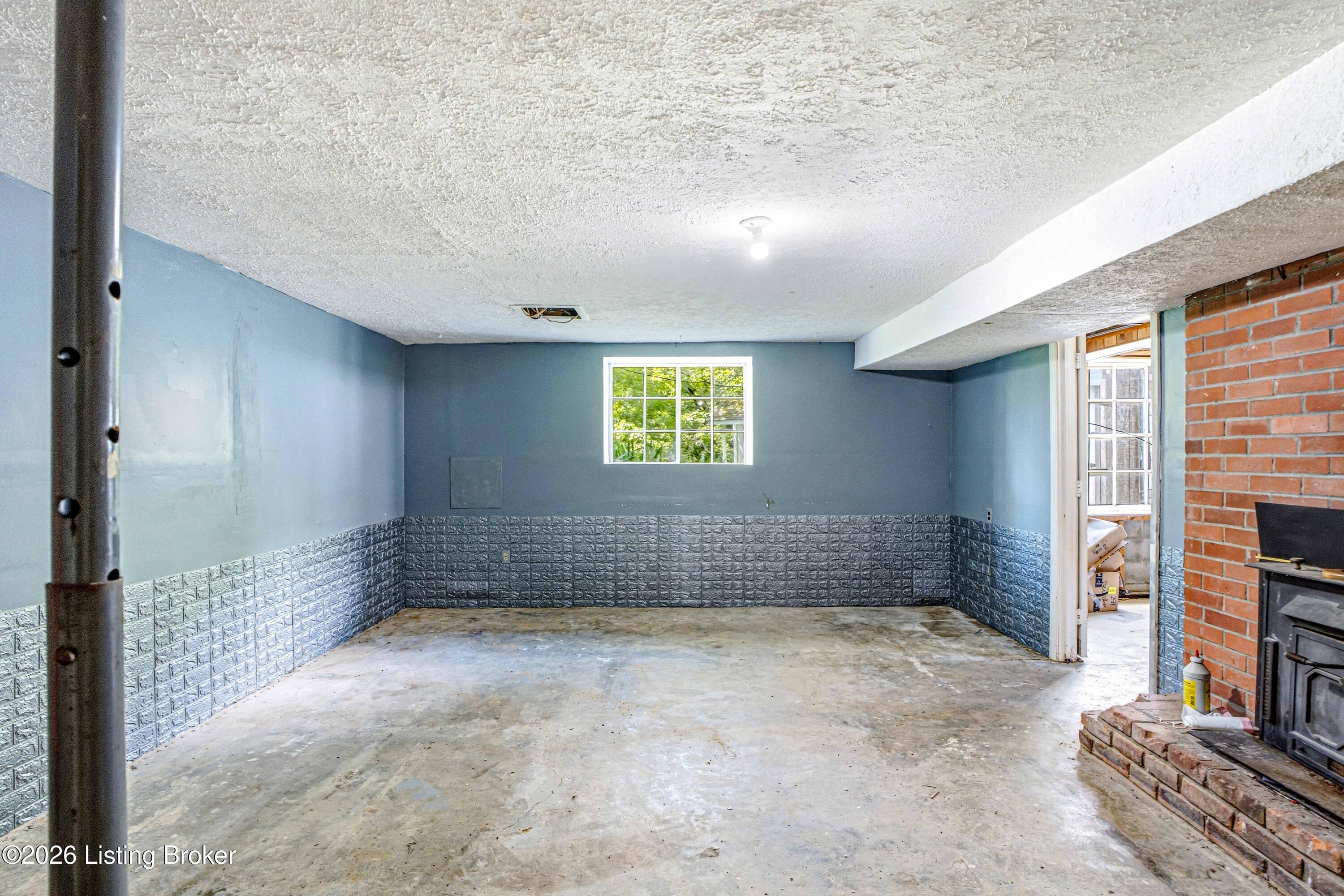 689 Graefenburg Road Waddy, KY 40076 - Photo 32 of 45 32_Basement_Room_Alt