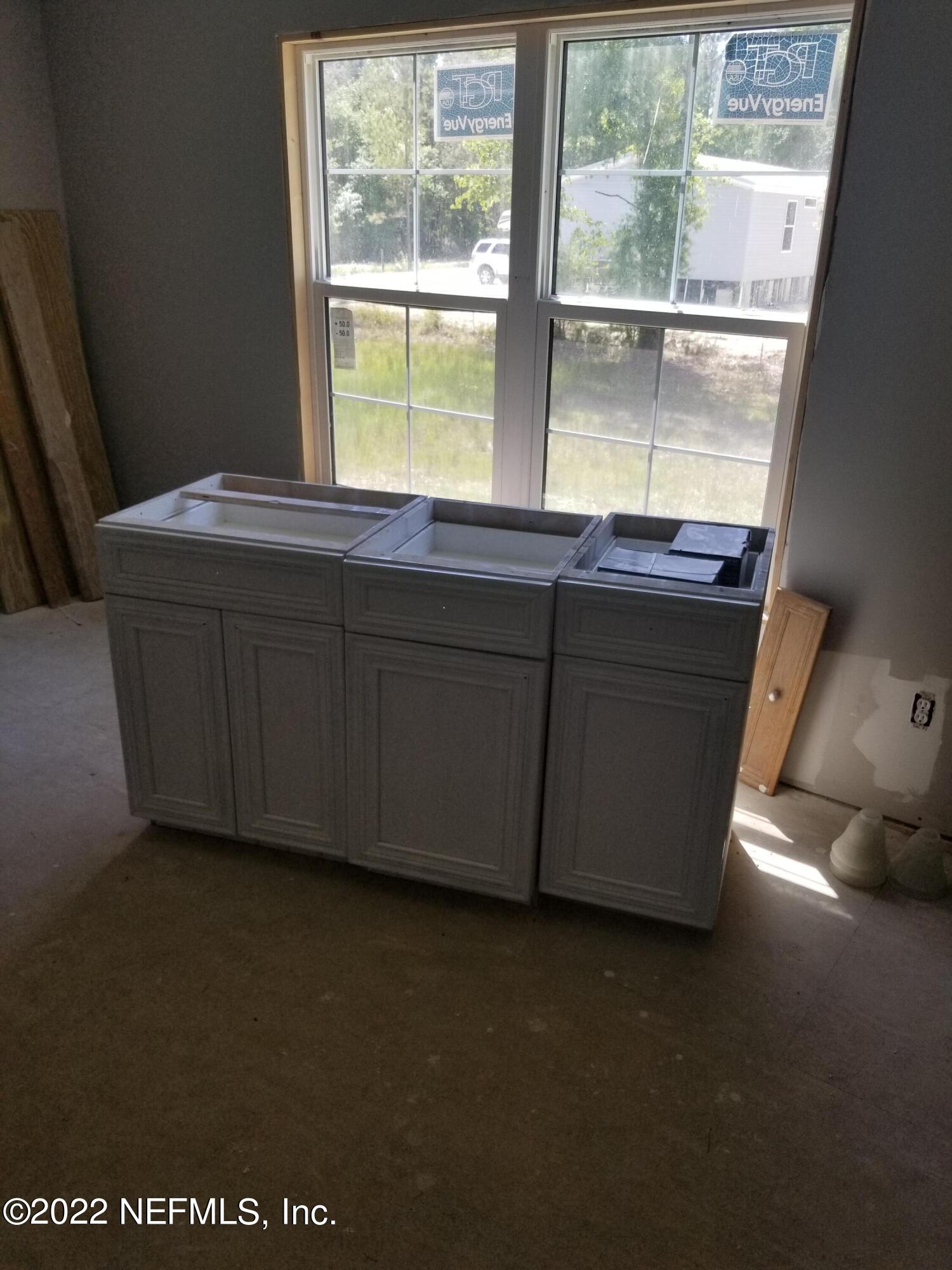 8505 Southwest 137th Street Starke, FL 32091 - Photo 7 of 10 a room with furniture and window