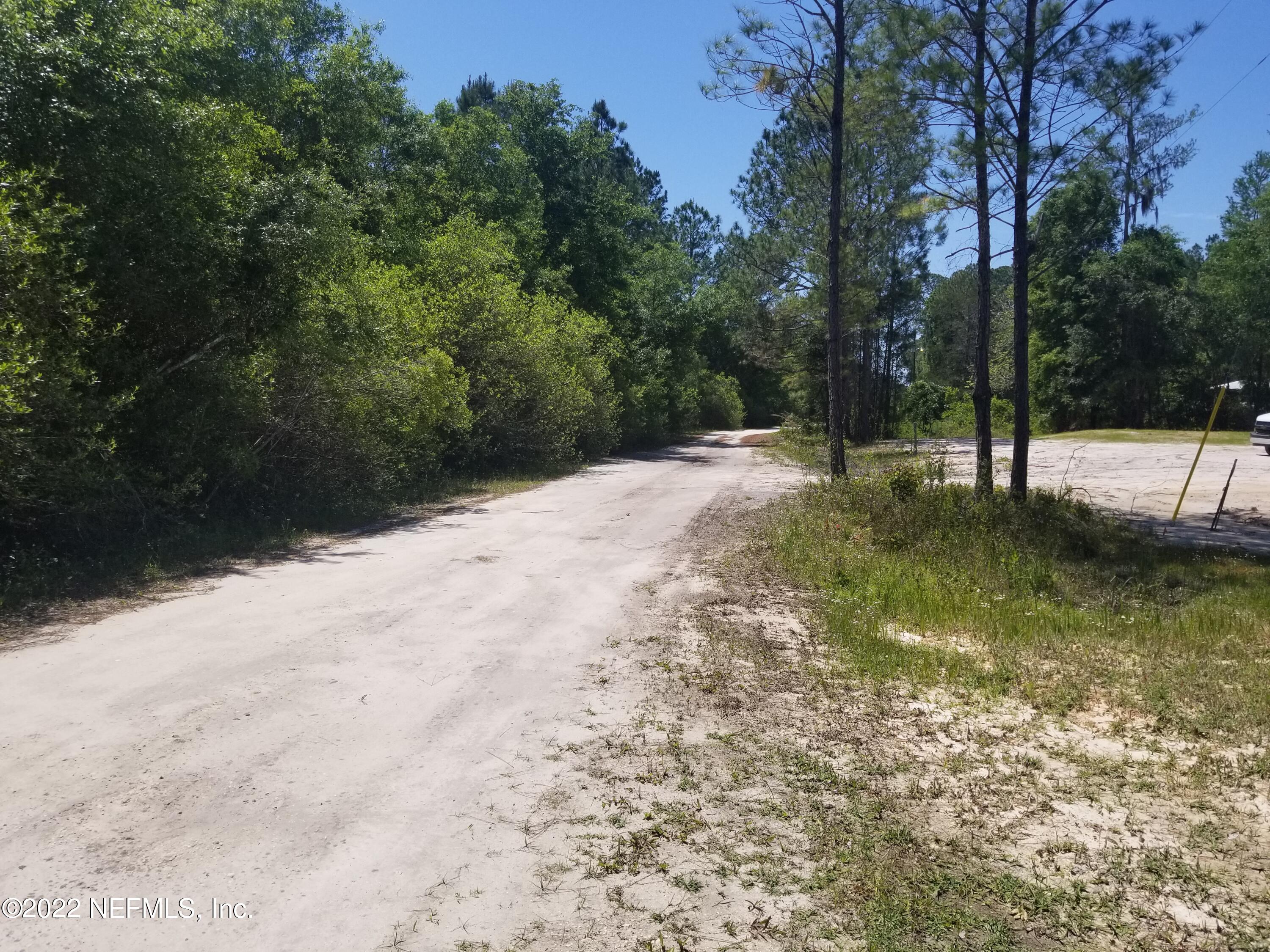 8505 Southwest 137th Street Starke, FL 32091 - Photo 9 of 10 a view of a backyard of the house
