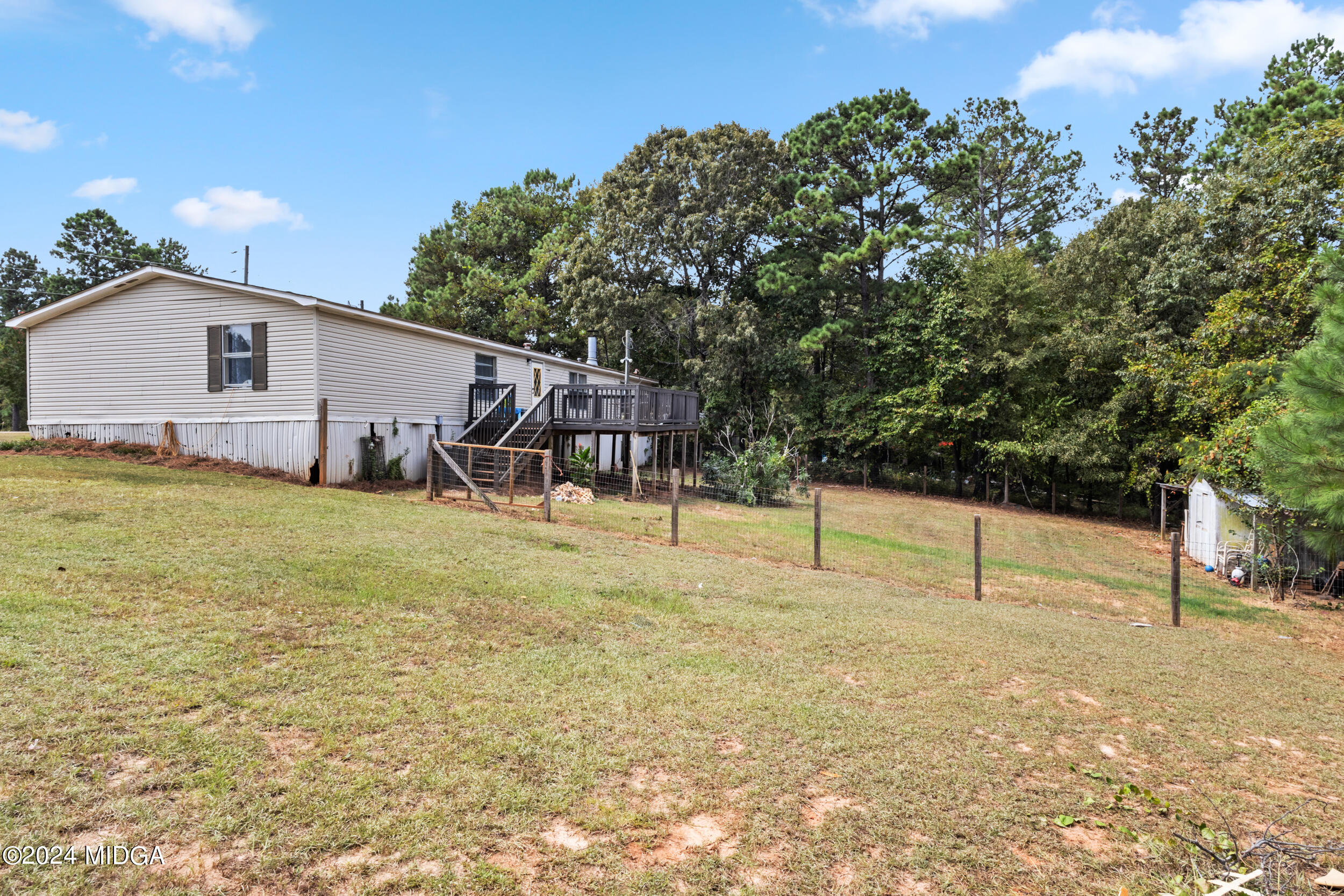 3195 Jordan Road Byron, GA 31008 - Photo 4 of 14 a view of a house with backyard