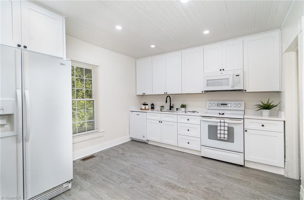310 West Ray Avenue High Point, NC 27262 - Photo 13 of 28 Nice and bright with large window and recessed lighting.