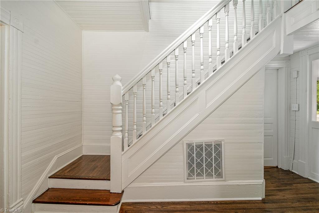310 West Ray Avenue High Point, NC 27262 - Photo 22 of 28 Stairs to 2 upstairs bedroom notice beadboard walls.