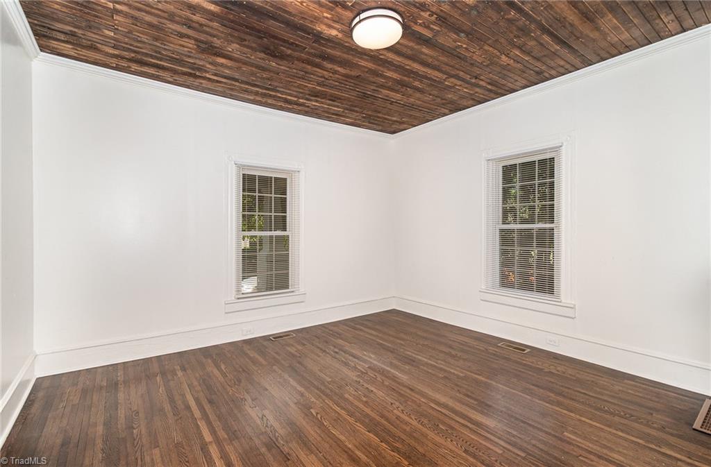 310 West Ray Avenue High Point, NC 27262 - Photo 8 of 28 Living Room has beautiful wood plank ceilings