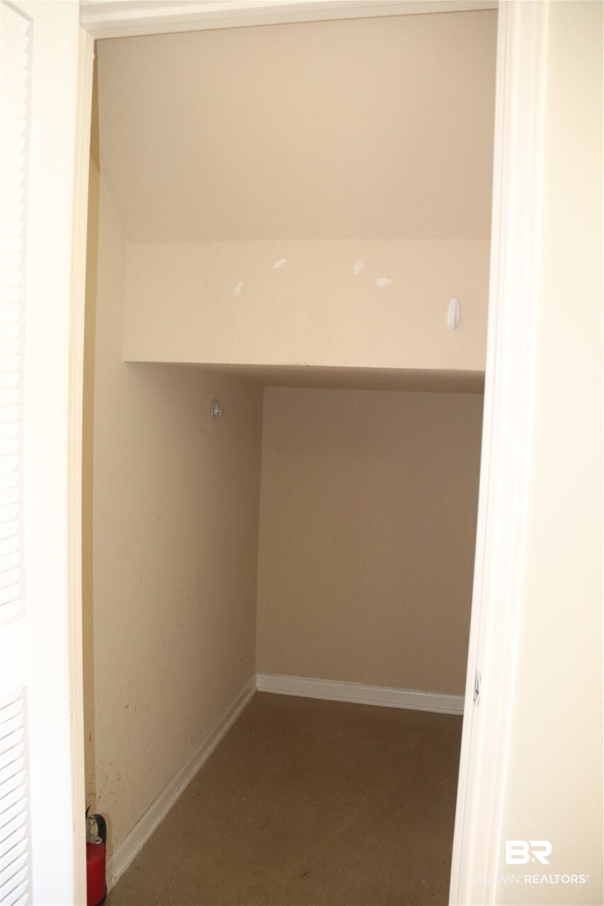 1517 Regency Road, Unit 122 Gulf Shores, AL 36542 - Photo 15 of 37 Stairway Storage