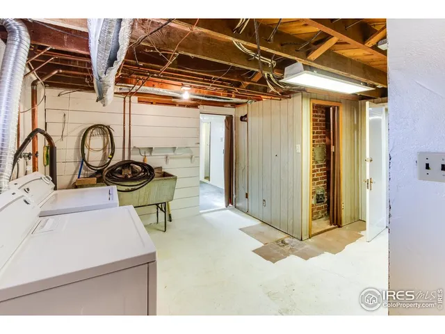 a view of a storage & utility room with washer and dryer