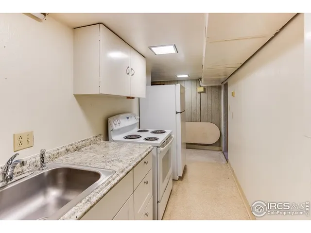 a bathroom with a toilet and a sink