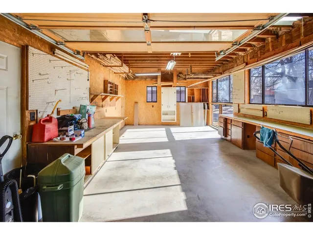 a view of a kitchen with furniture