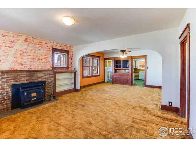 a view of a livingroom with a fireplace