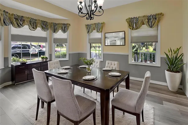a spacious bathroom with a double vanity sink mirror and toilet