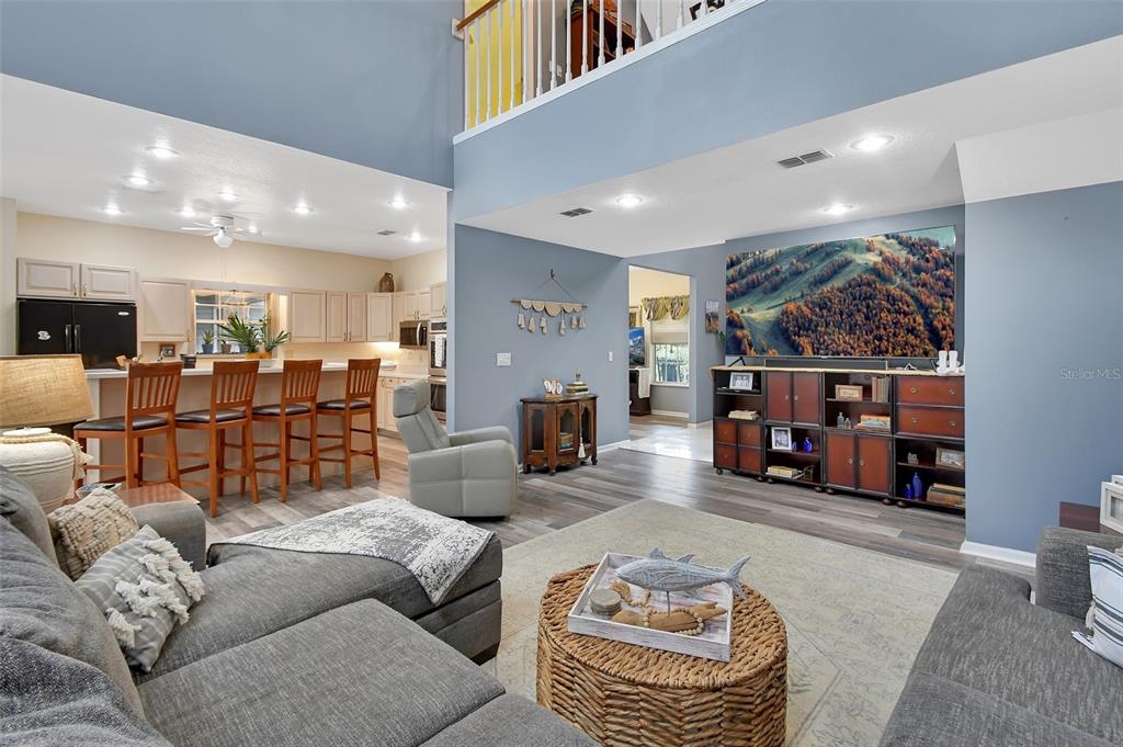 2236 River Ridge Road DeLand, FL 32720 - Photo 2 of 84 a living room with furniture and a flat screen tv