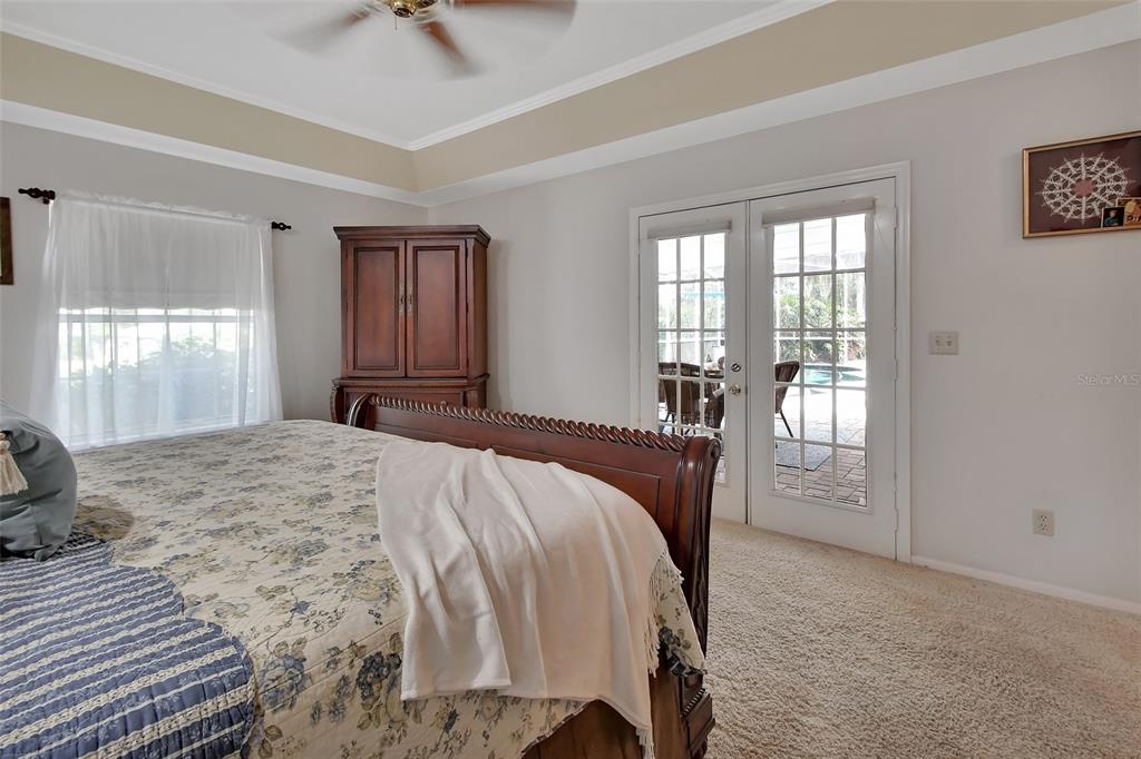 2236 River Ridge Road DeLand, FL 32720 - Photo 27 of 84 a bedroom with a bed a table and chair
