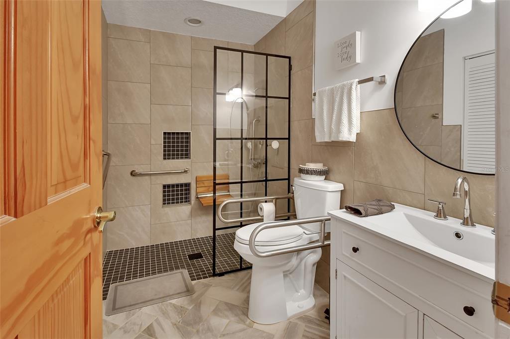 2236 River Ridge Road DeLand, FL 32720 - Photo 32 of 84 a bathroom with a sink toilet and shower