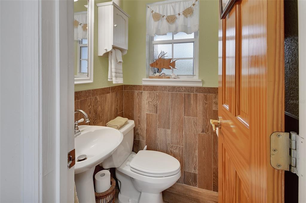 2236 River Ridge Road DeLand, FL 32720 - Photo 33 of 84 a bathroom with a toilet and a sink