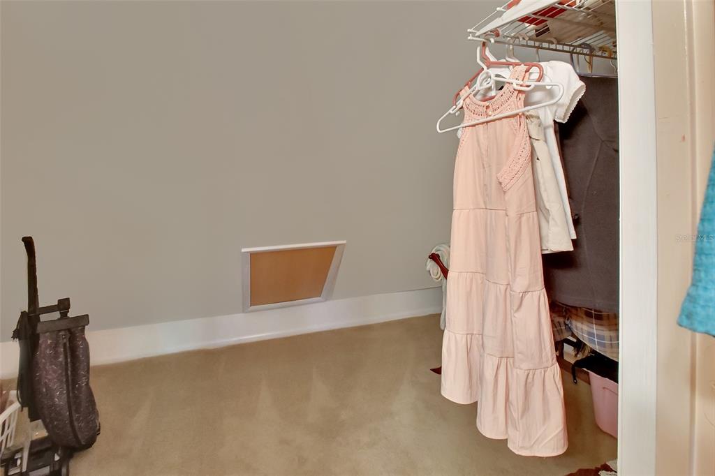 2236 River Ridge Road DeLand, FL 32720 - Photo 42 of 84 a view of walk in closet with clothes and shoes