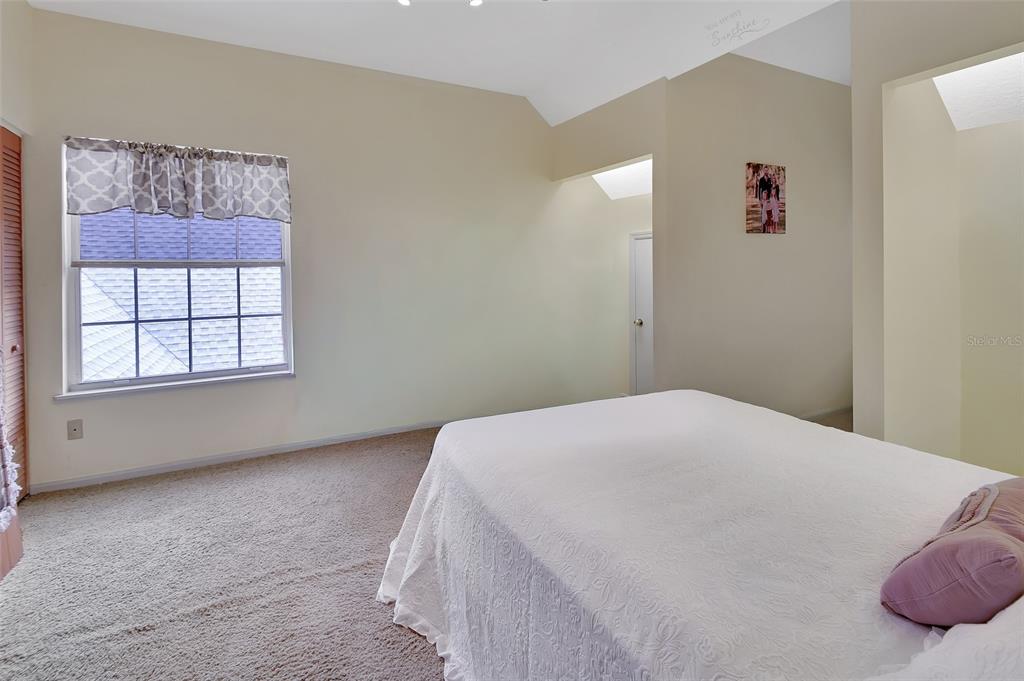 2236 River Ridge Road DeLand, FL 32720 - Photo 43 of 84 a bedroom with a bed and a window