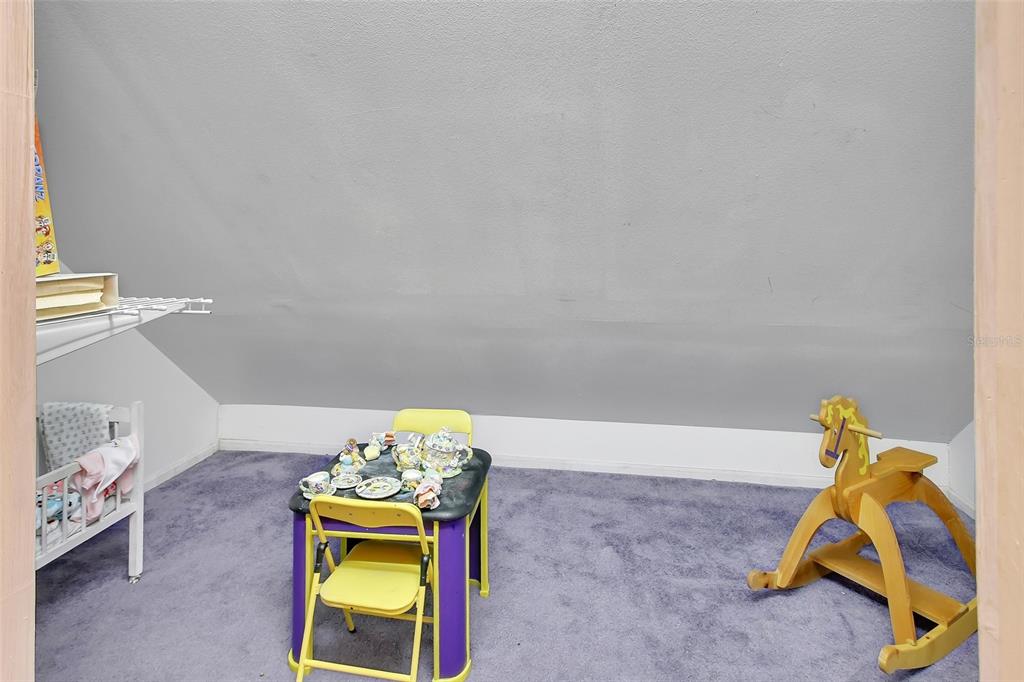 2236 River Ridge Road DeLand, FL 32720 - Photo 48 of 84 a bedroom with a bed and a window