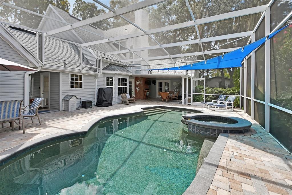 2236 River Ridge Road DeLand, FL 32720 - Photo 52 of 84 a view of a swimming pool with a patio and a patio