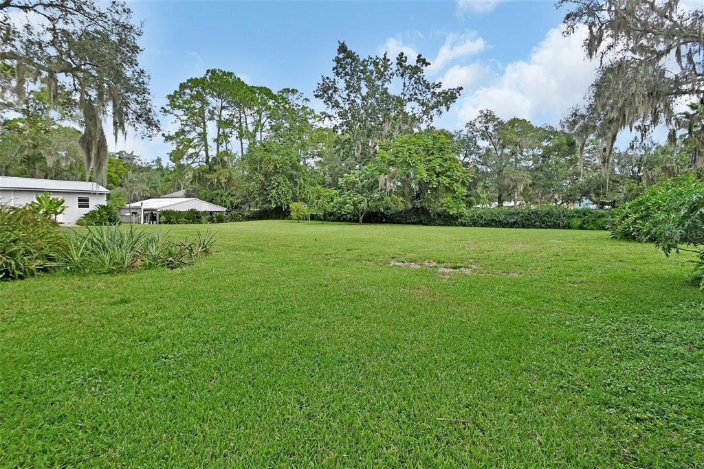 2236 River Ridge Road DeLand, FL 32720 - Photo 53 of 84 a view of an outdoor space and a yard