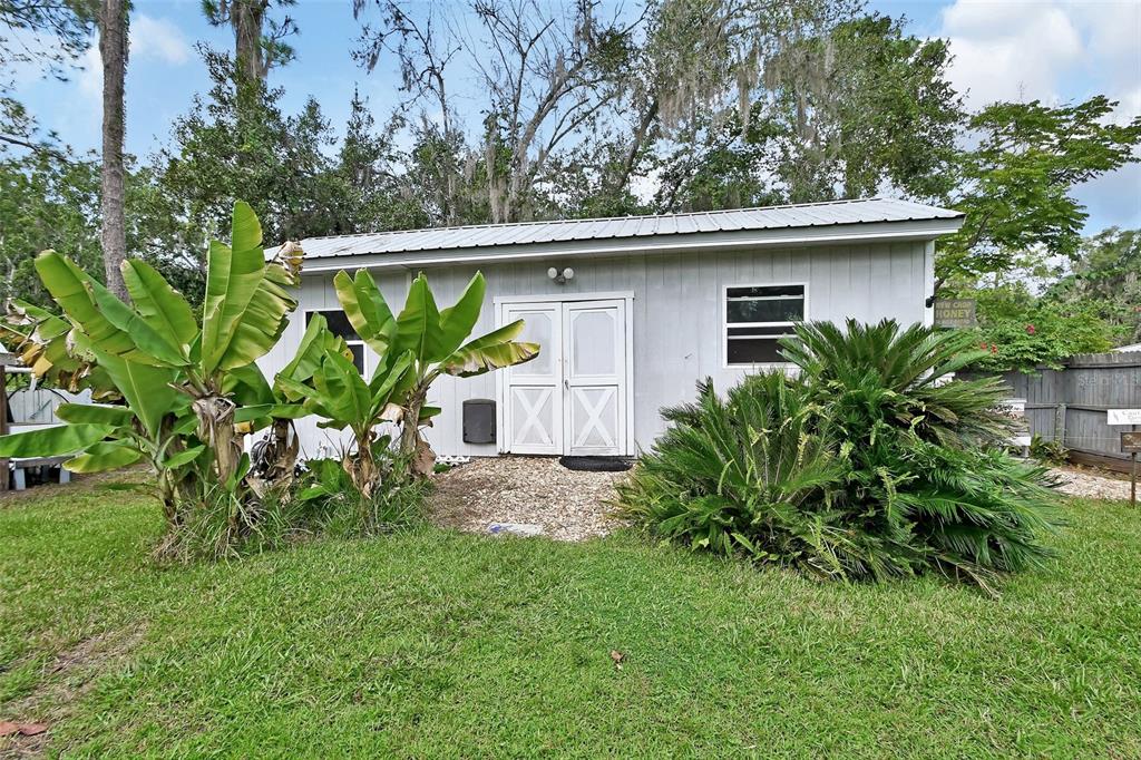 2236 River Ridge Road DeLand, FL 32720 - Photo 55 of 84 a view of a house with a yard