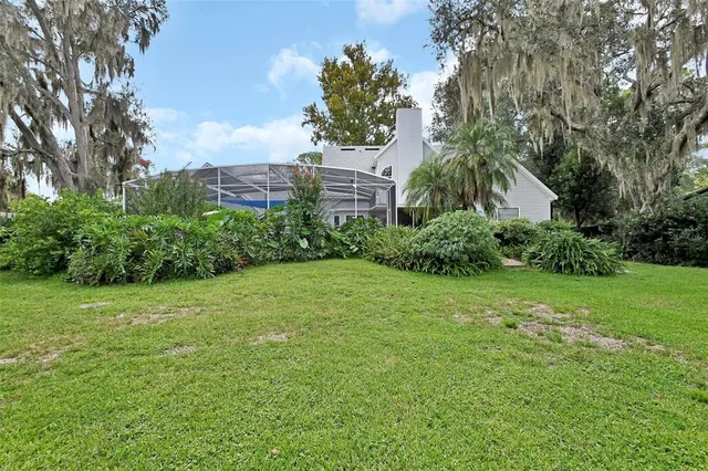 a living room with furniture a window and a table