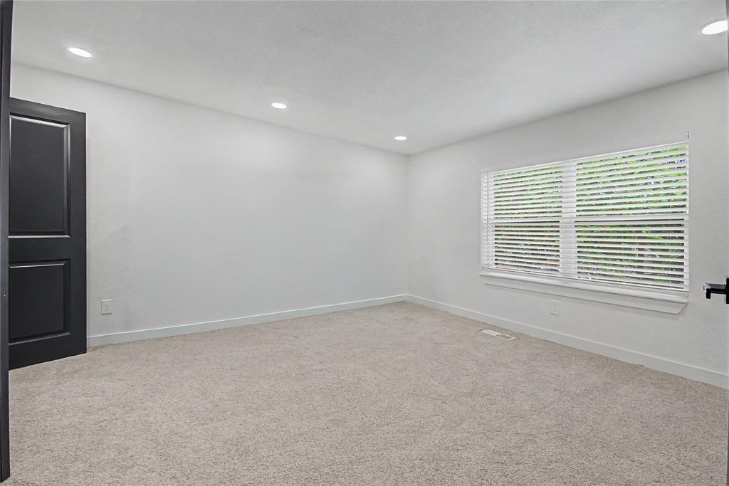 502 Rogers Way Rockwall, TX 75087 - Photo 14 of 23 a view of an empty room with a window