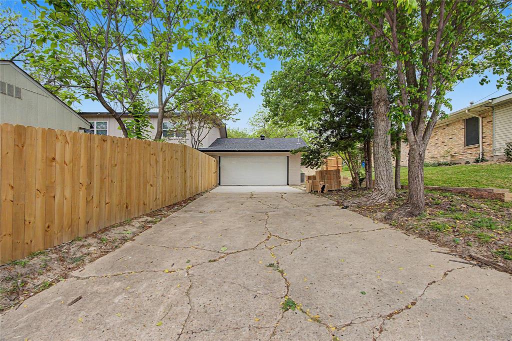 502 Rogers Way Rockwall, TX 75087 - Photo 23 of 23 a view of garage and yard