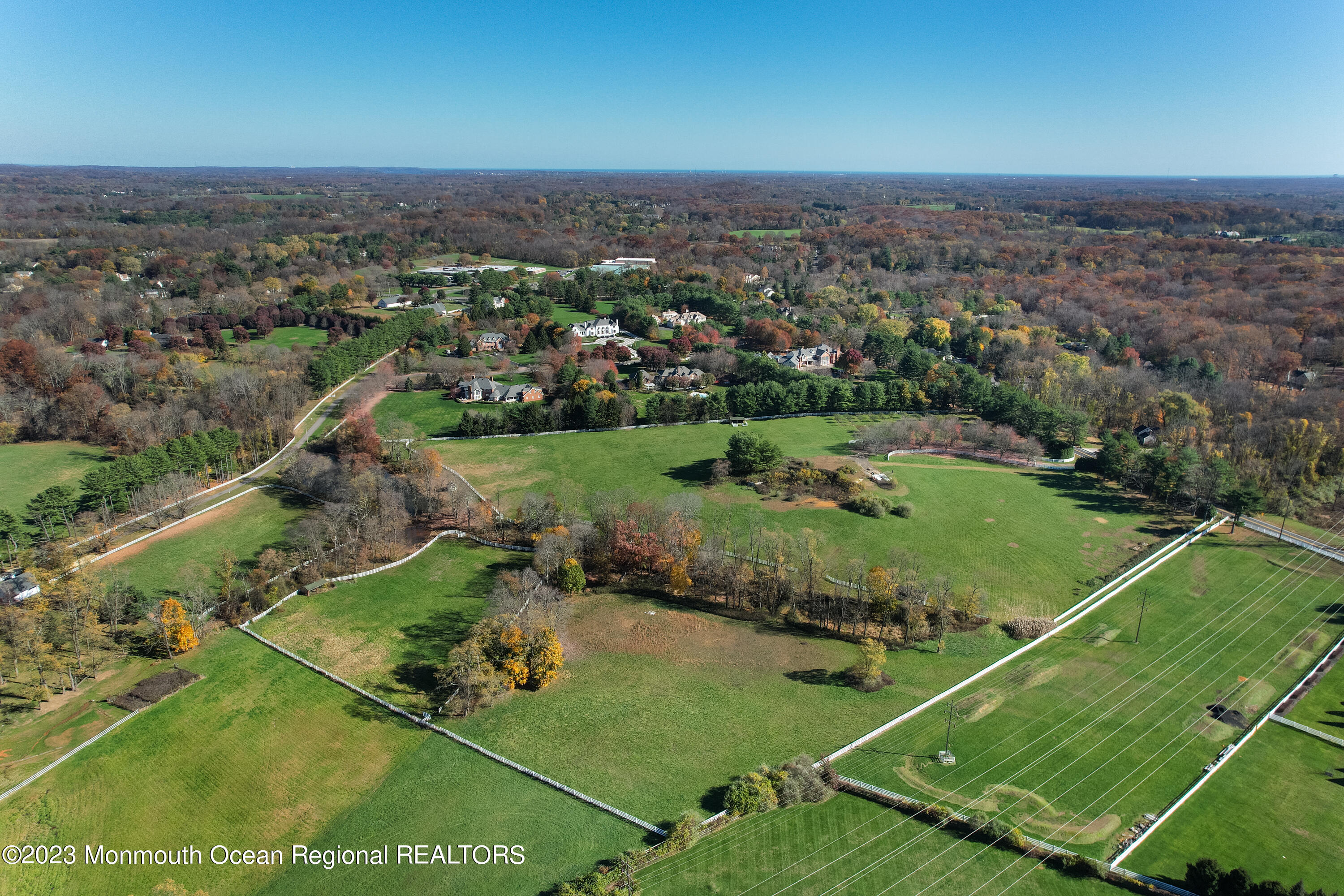 55 Crine Road Colts Neck, NJ 07722 - Photo 18 of 28 an aerial view of residential houses with outdoor space and trees