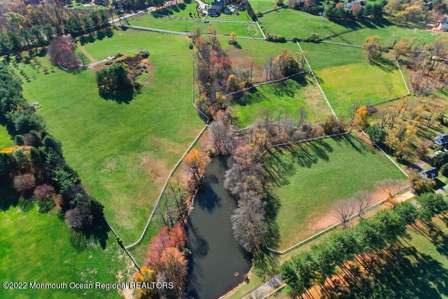 55 Crine Road Colts Neck, NJ 07722 - Photo 2 of 28 an aerial view of a golf course with parking space