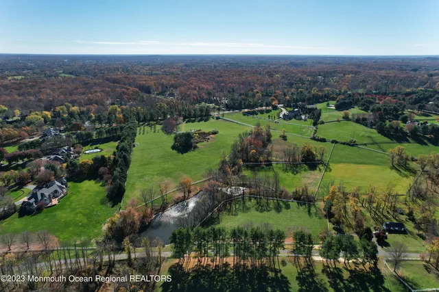 an aerial view of city and lake