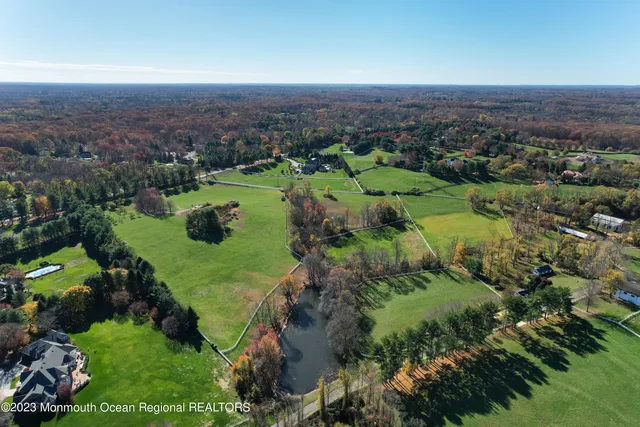 an aerial view of a golf course with parking space