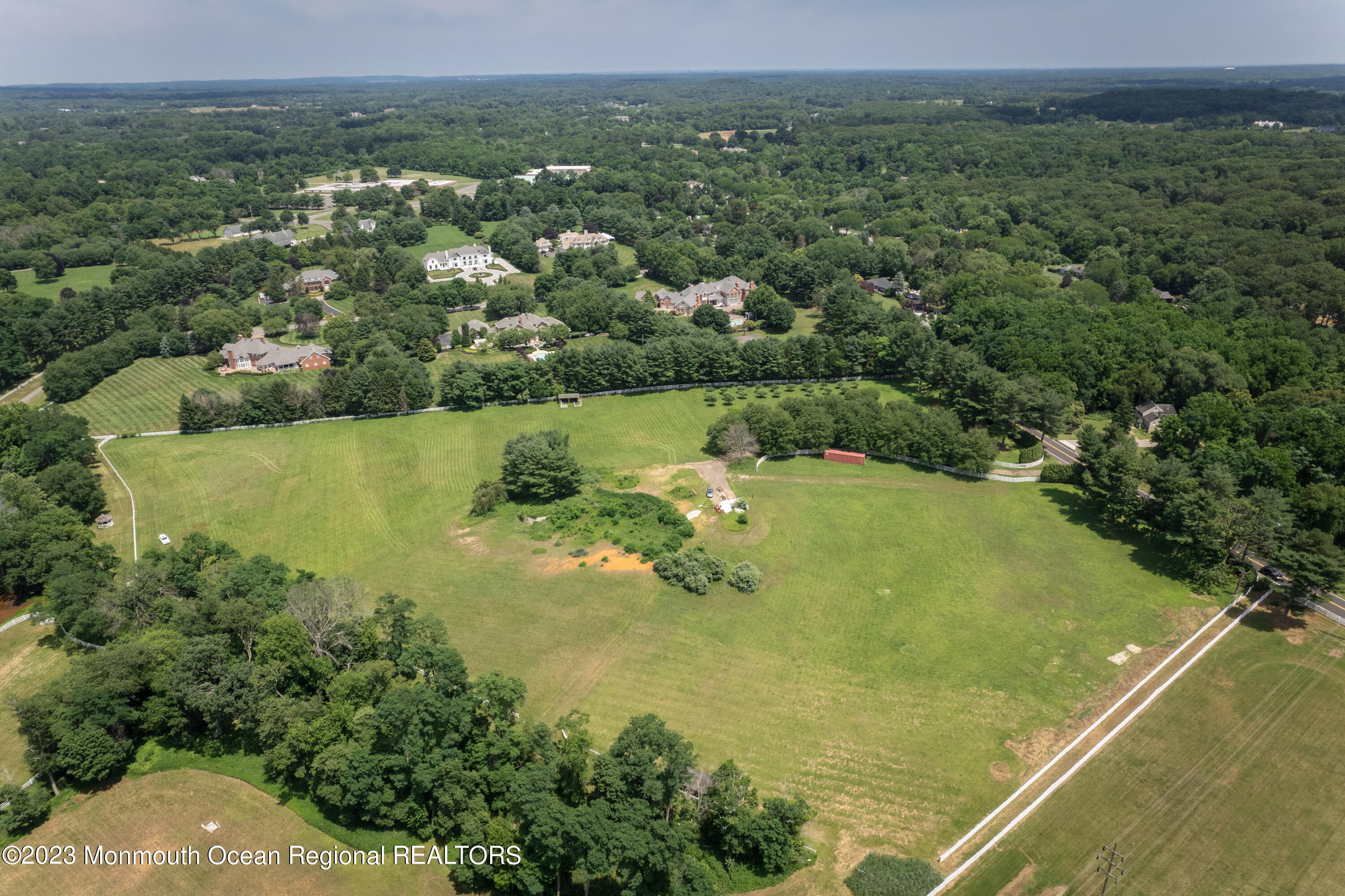 55 Crine Road Colts Neck, NJ 07722 - Photo 4 of 28 a view of a lake with a city