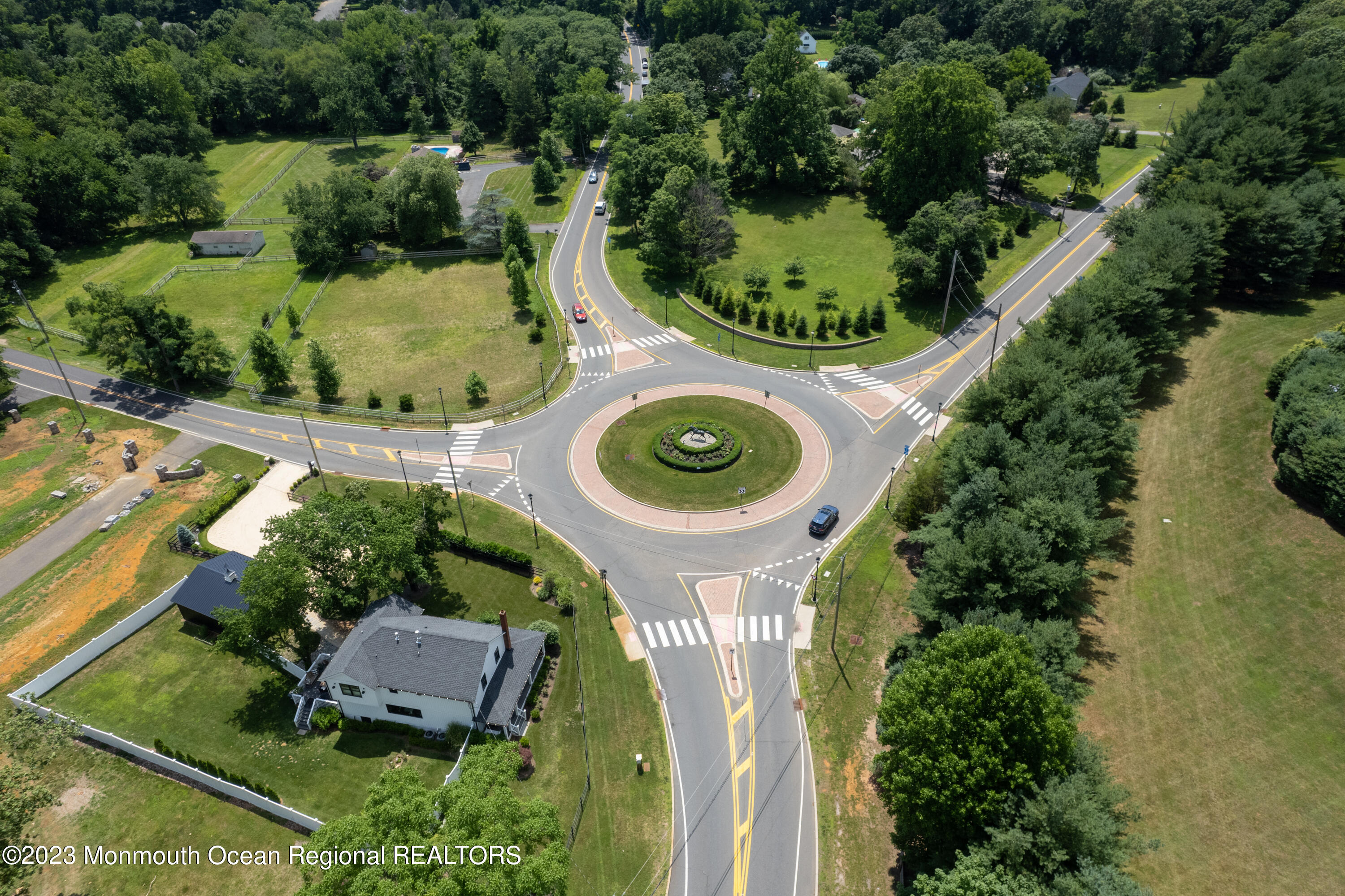55 Crine Road Colts Neck, NJ 07722 - Photo 10 of 28 an aerial view of a house with outdoor space and street view