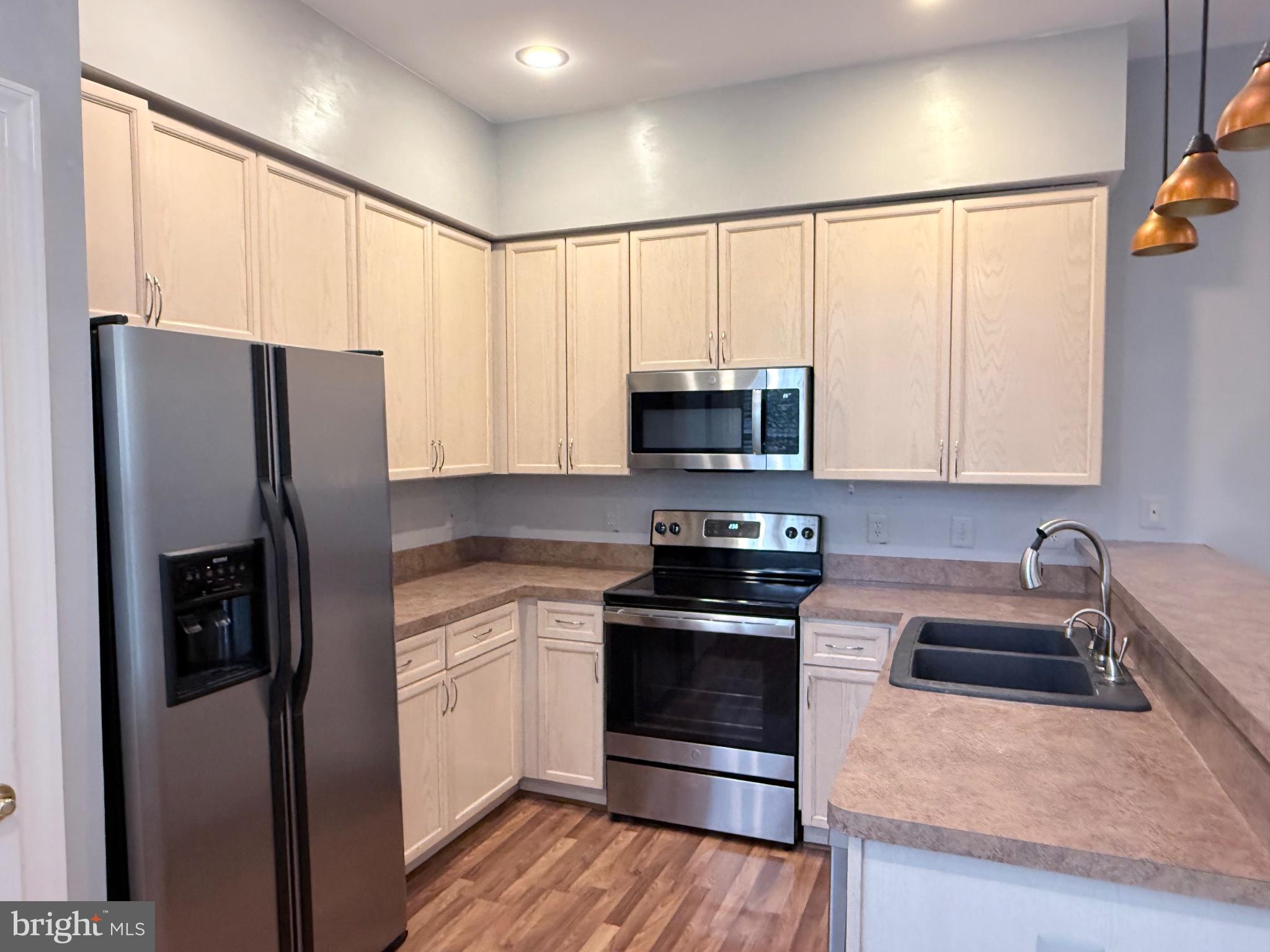 5936 Halpine Road Rockville, MD 20851 - Photo 12 of 44 Modern kitchen with sleek finishes