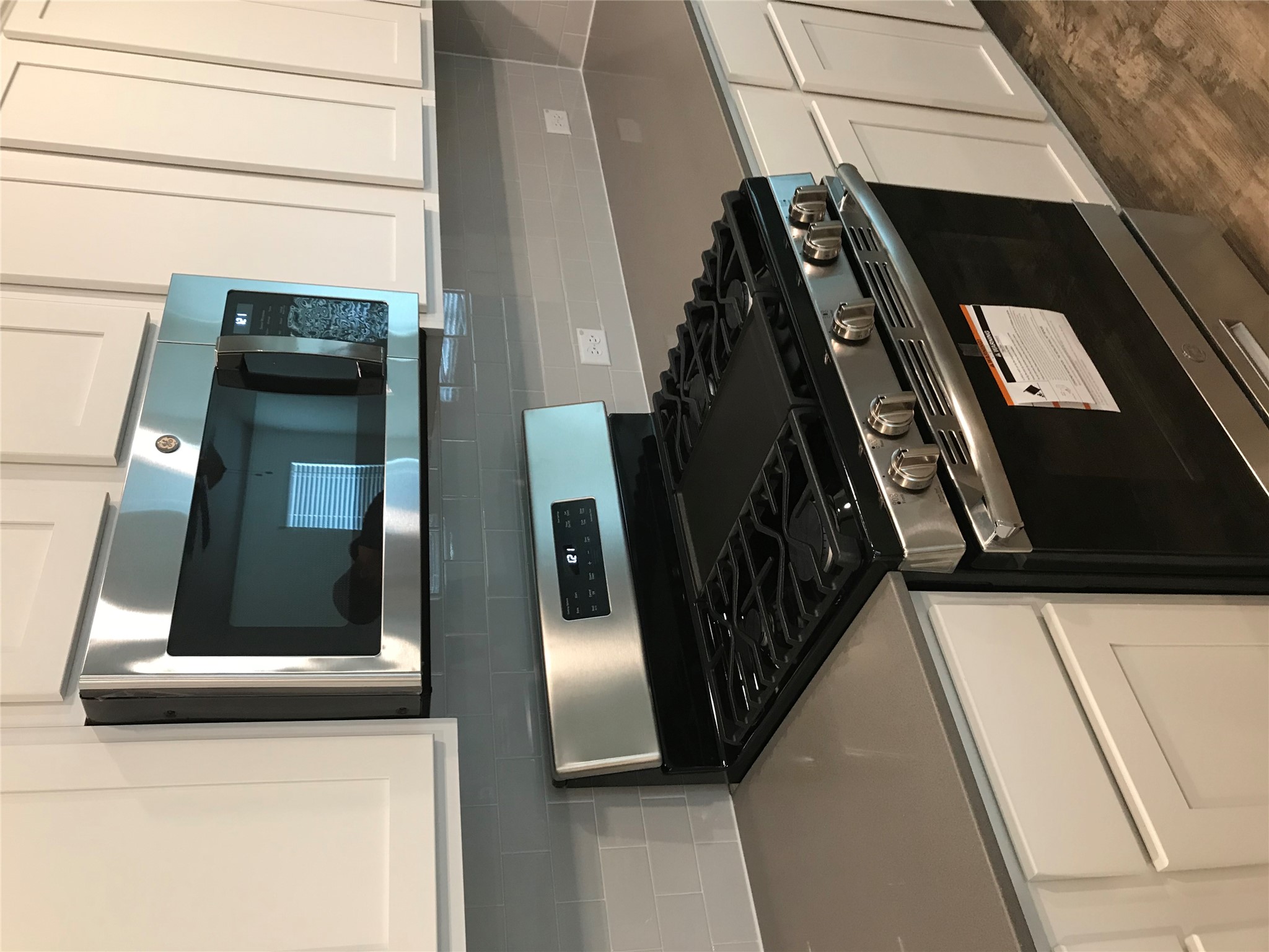 1200 Nokota Bend Georgetown, TX 78626 - Photo 16 of 39 a stove top oven sitting inside of a kitchen