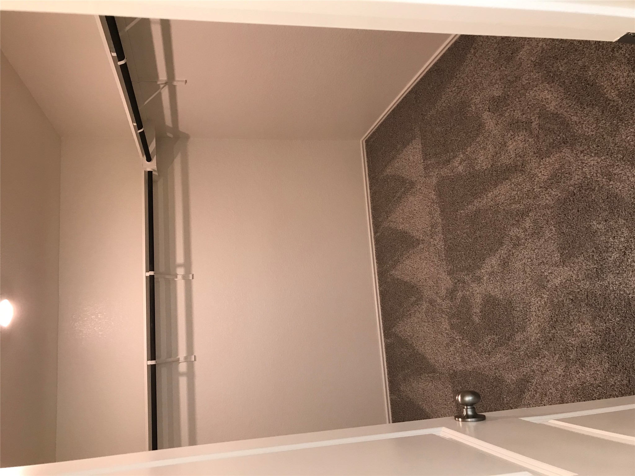1200 Nokota Bend Georgetown, TX 78626 - Photo 24 of 39 a view of a room with racks on the wall