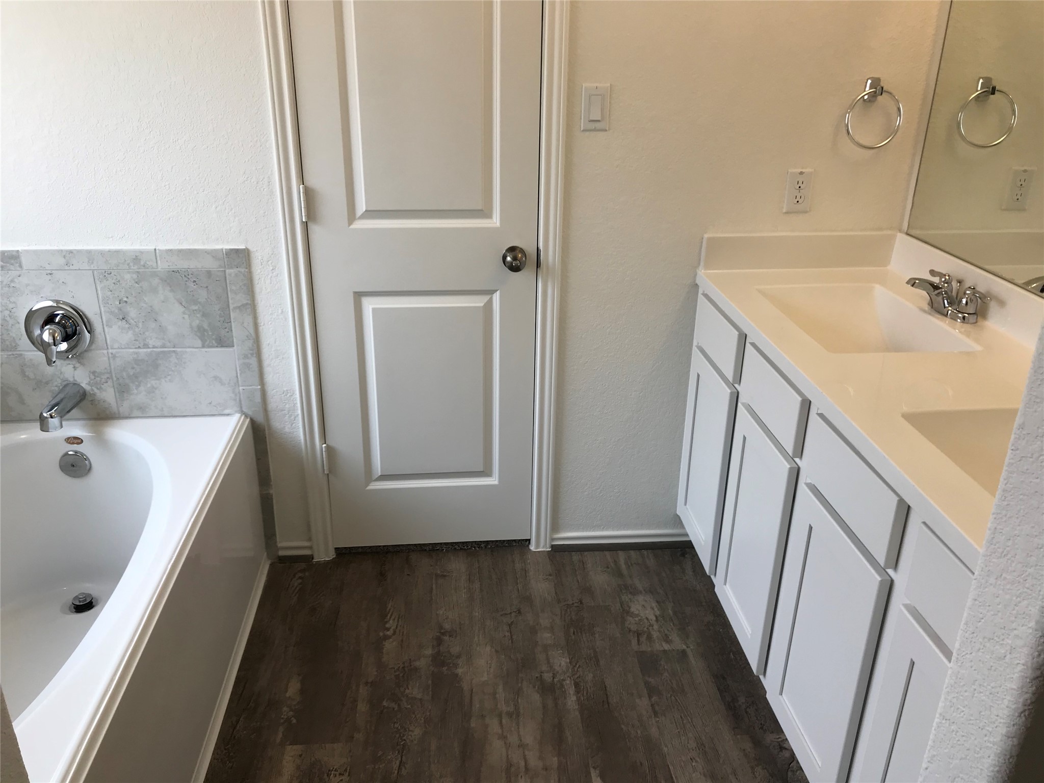 1200 Nokota Bend Georgetown, TX 78626 - Photo 25 of 39 a bathroom with a sink and a tub